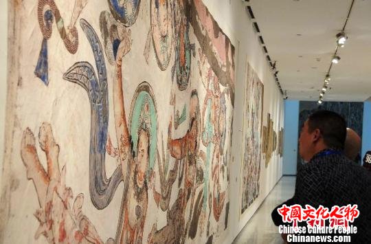 图为新疆龟兹研究院复制的壁画，　罗永皓 摄